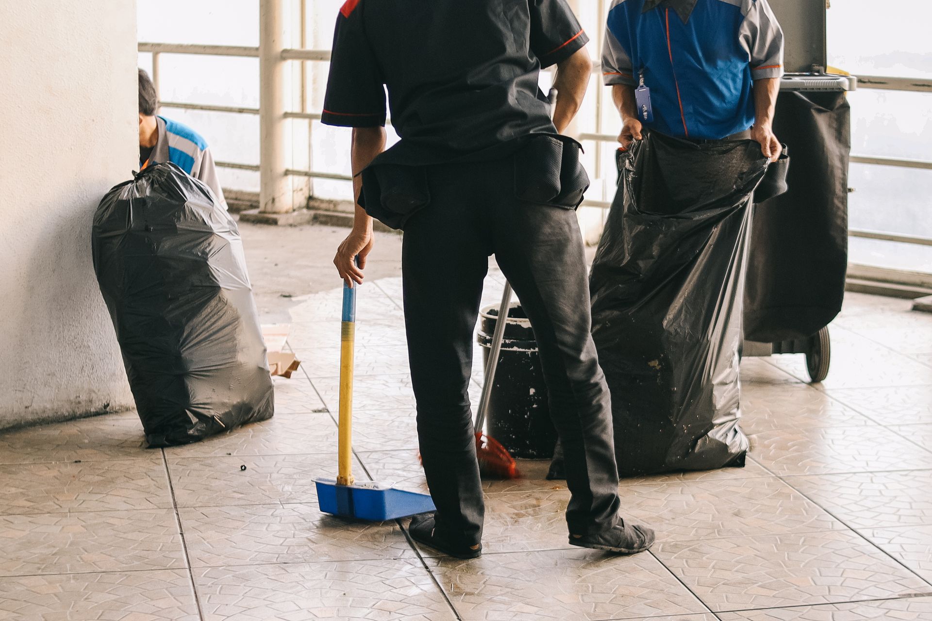 Revive Cleaning Crew team cleaning a floor on a job in San Antonio
